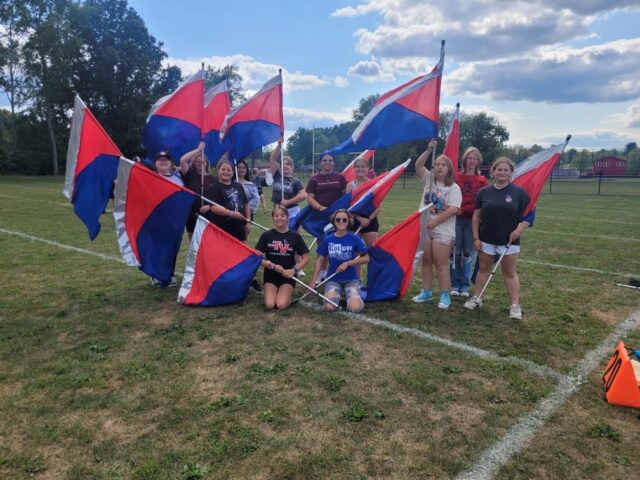 color guard with new school flags